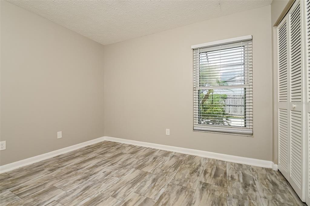 1601 Loghill Place Brandon, FL 33510 - Photo 12 of 15 an empty room with a window