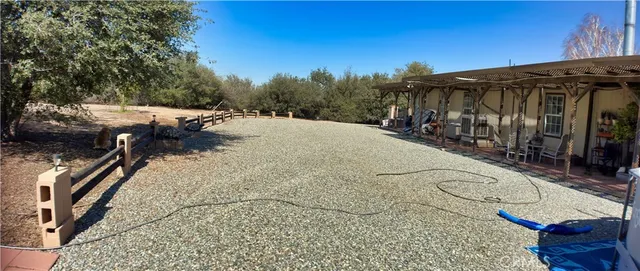 a view of a backyard of the house