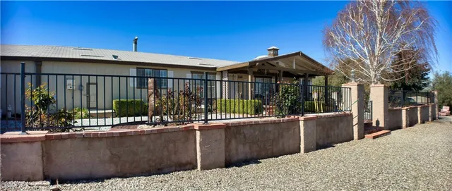 a view of a house with roof and porch
