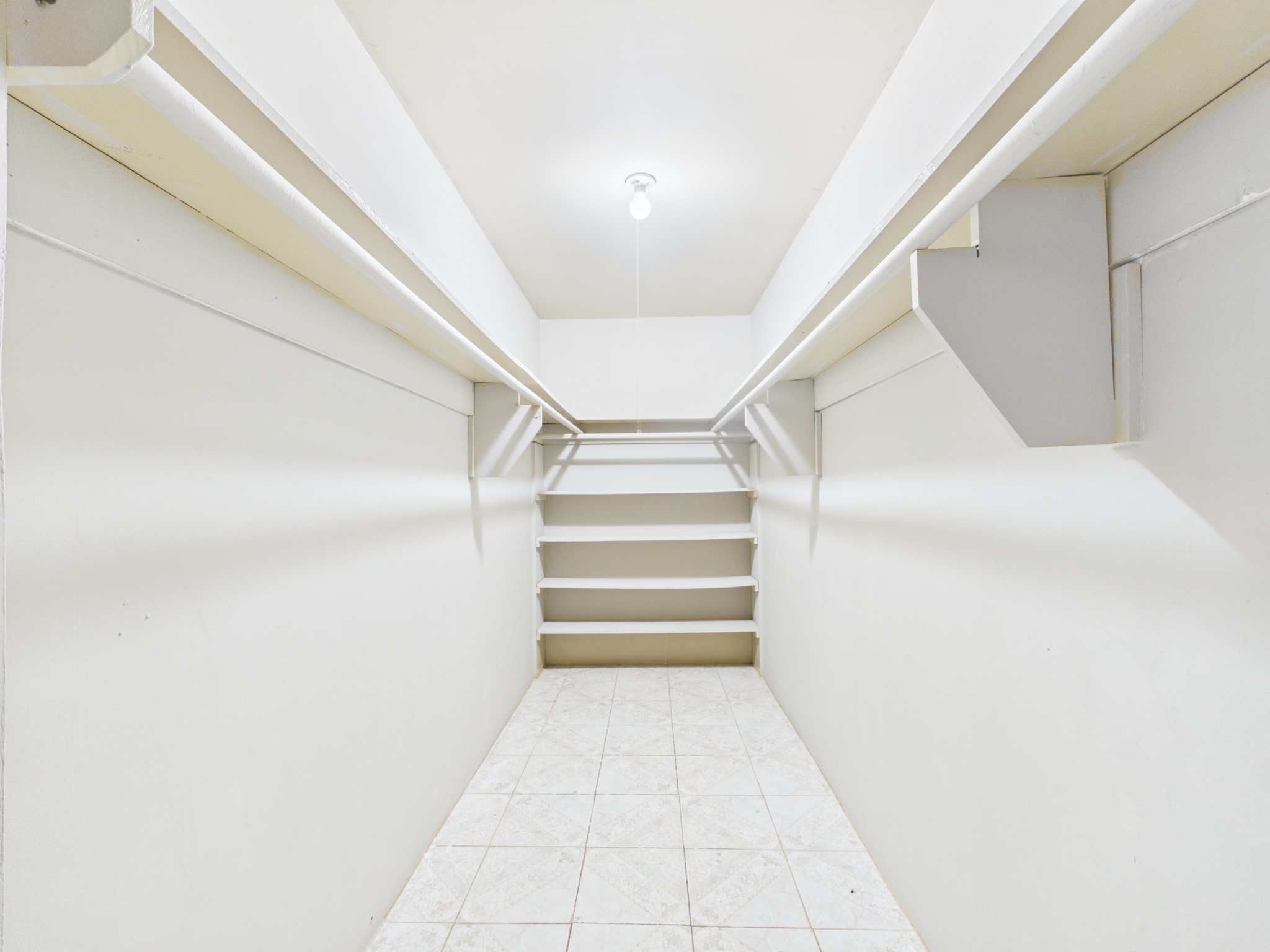 6500 Rampart Street, Unit 28 Houston, TX 77081 - Photo 13 of 19 Spacious primary closet
