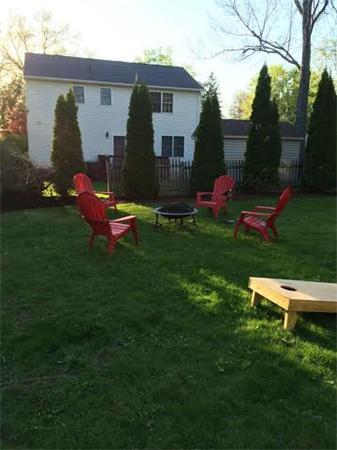 1562 Plumtree Road Springfield, MA 01119 - Photo 4 of 21 a backyard of a house with table and chairs