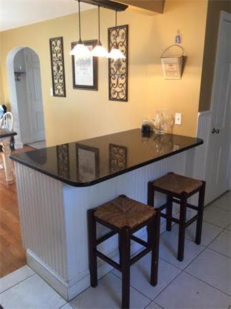 1562 Plumtree Road Springfield, MA 01119 - Photo 7 of 21 a view of kitchen island with furniture