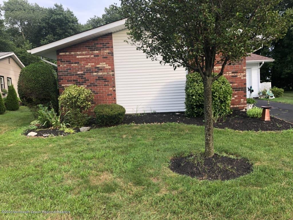 64 Baser Lane Brick, NJ 08724 - Photo 1 of 1 a view of a backyard with a garden