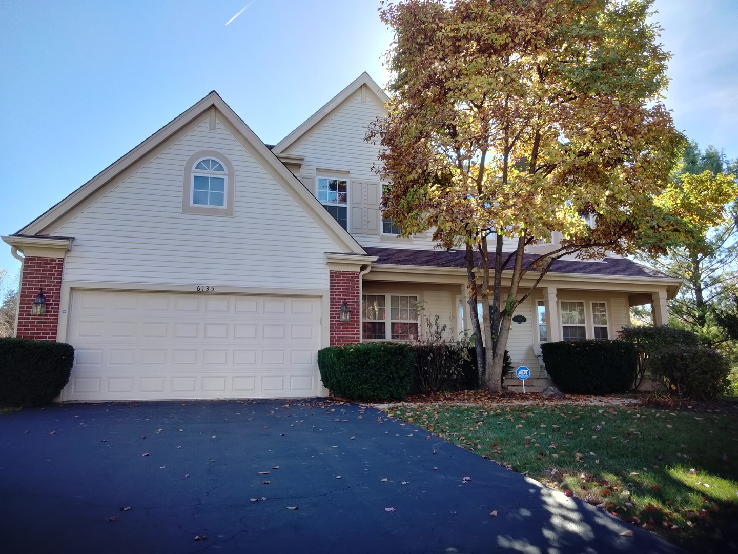 6135 Murifield Drive Gurnee, IL 60031 - Photo 2 of 6 a front view of house with yard and green space
