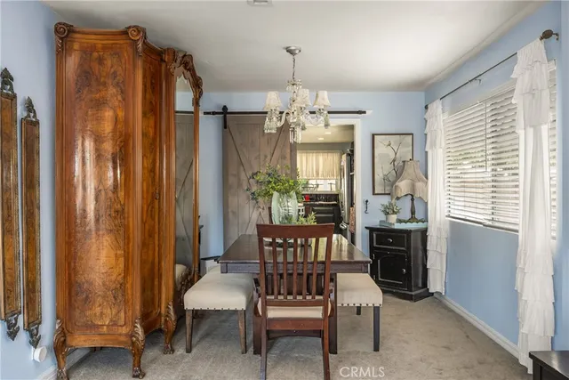a view of a livingroom with furniture and window