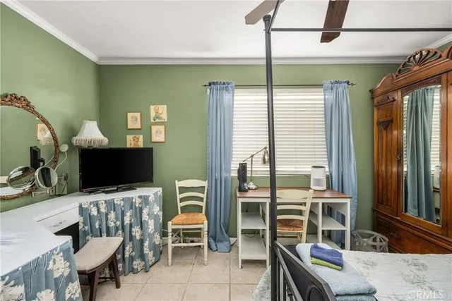 a view of a livingroom with furniture and a flat screen tv