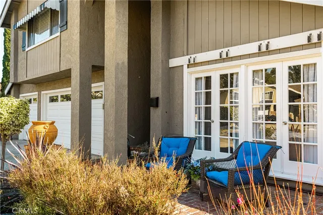 a front view of a house with patio