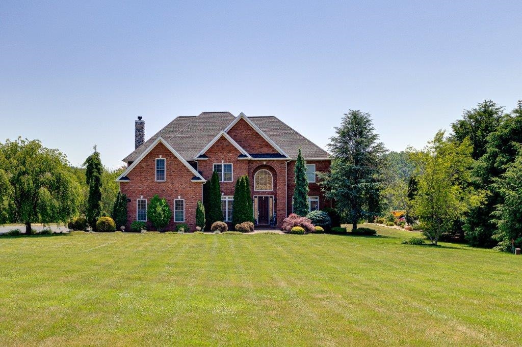 a front view of house with yard
