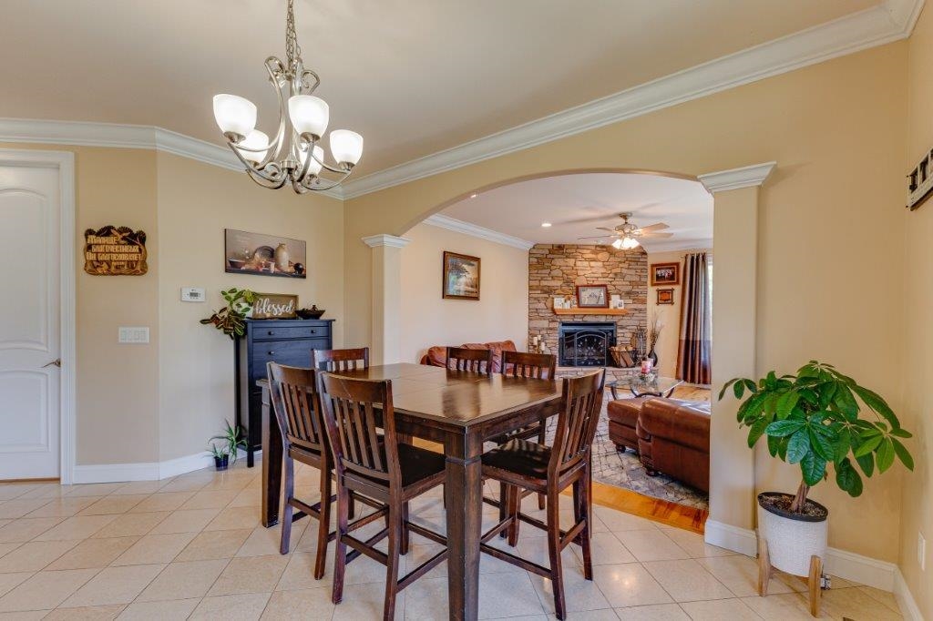 61 Bridgewater Road Bridgewater, VA 22812 - Photo 14 of 75 a view of a dining room with furniture and chandelier
