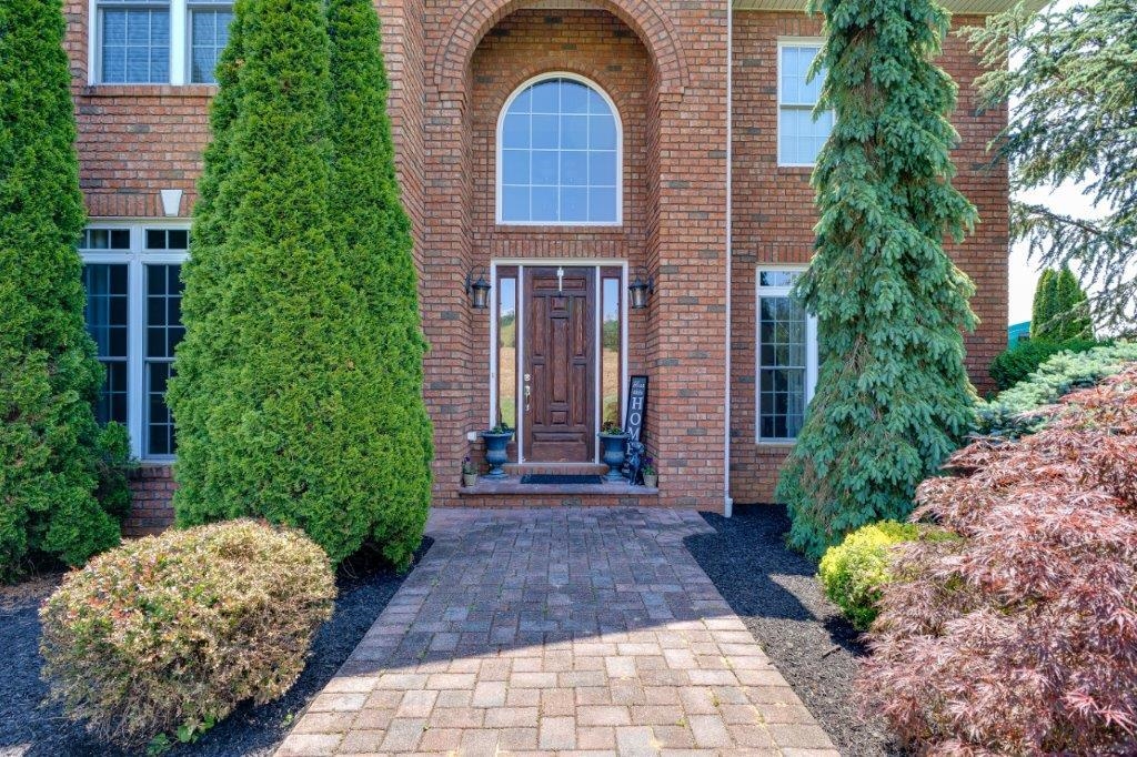 61 Bridgewater Road Bridgewater, VA 22812 - Photo 2 of 75 a front view of a house with garden
