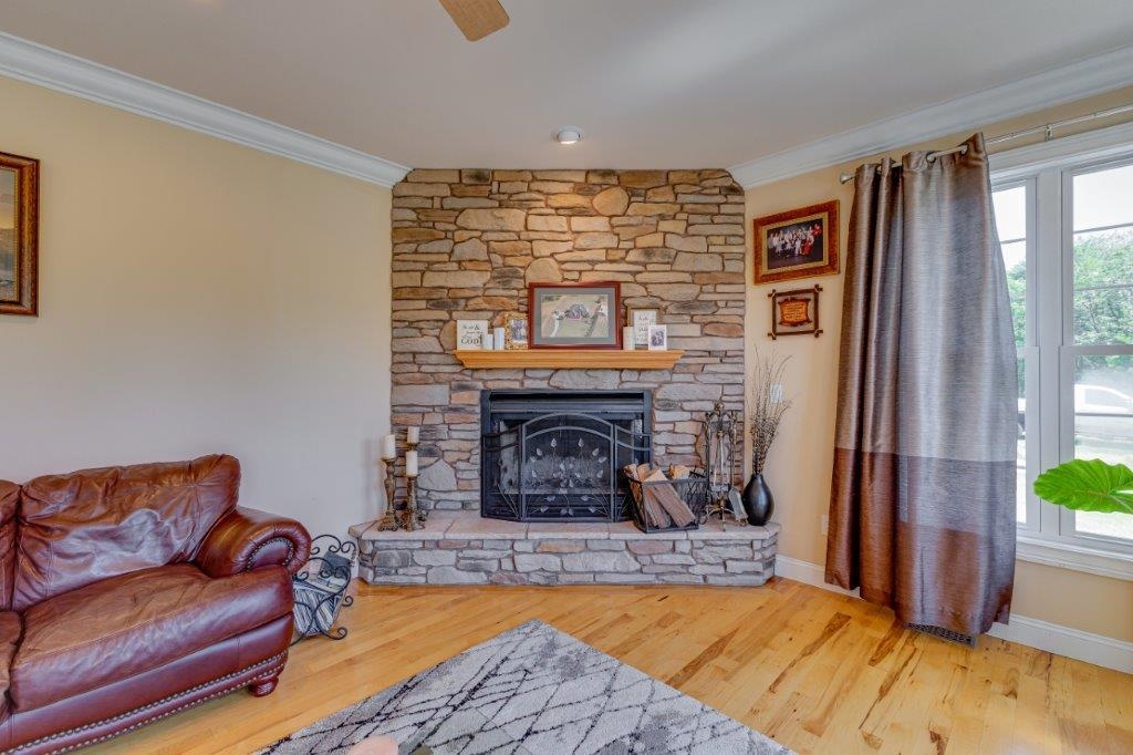 61 Bridgewater Road Bridgewater, VA 22812 - Photo 21 of 75 a living room with furniture and a fireplace