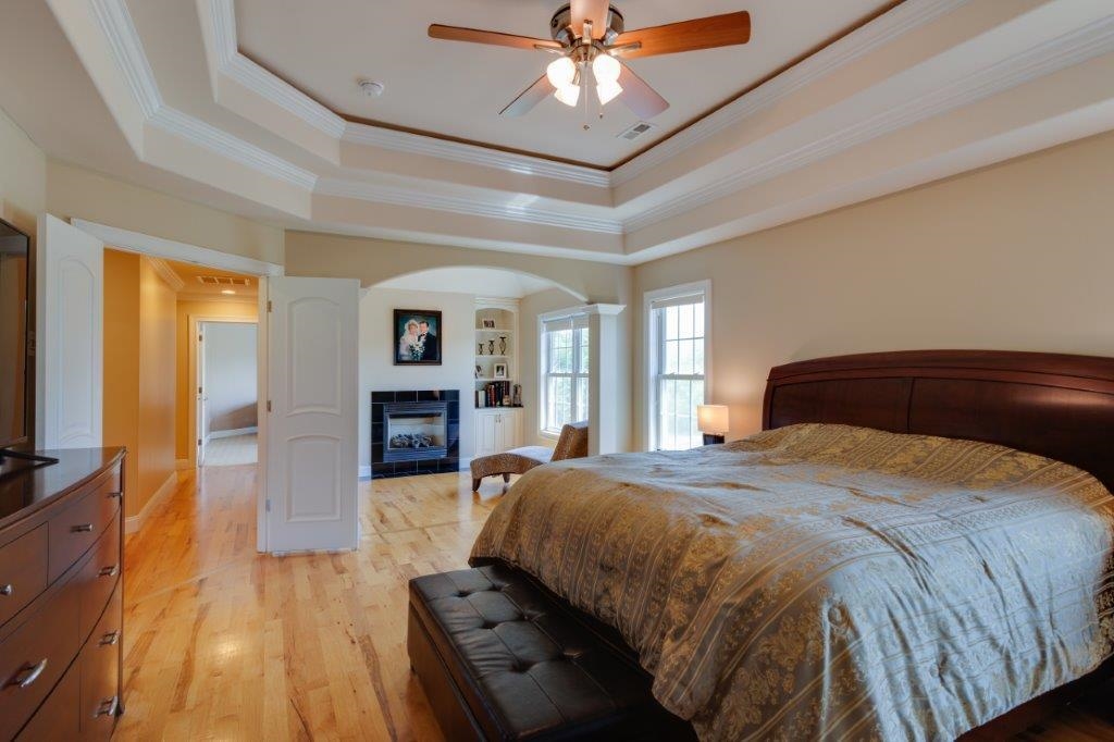 61 Bridgewater Road Bridgewater, VA 22812 - Photo 27 of 75 a bedroom with a bed and a flat tv screen on dresser