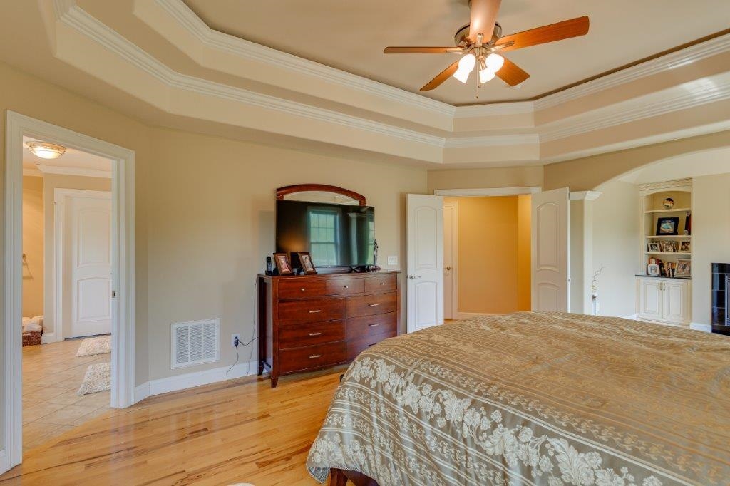 61 Bridgewater Road Bridgewater, VA 22812 - Photo 29 of 75 a bedroom with a bed and a mirror on dresser