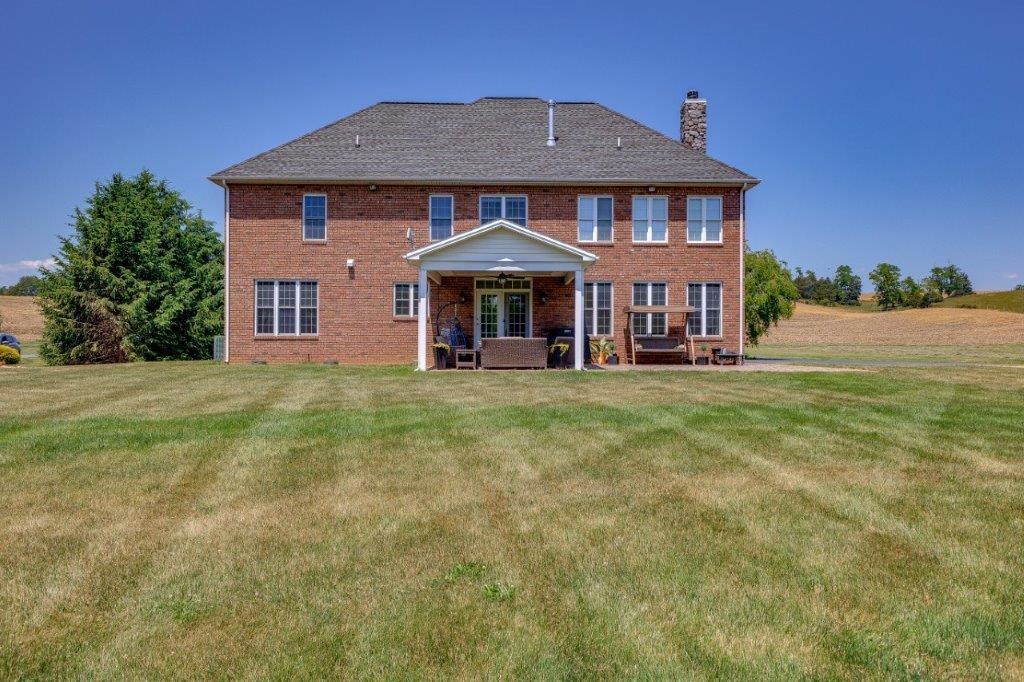 61 Bridgewater Road Bridgewater, VA 22812 - Photo 56 of 75 a front view of a house with a yard
