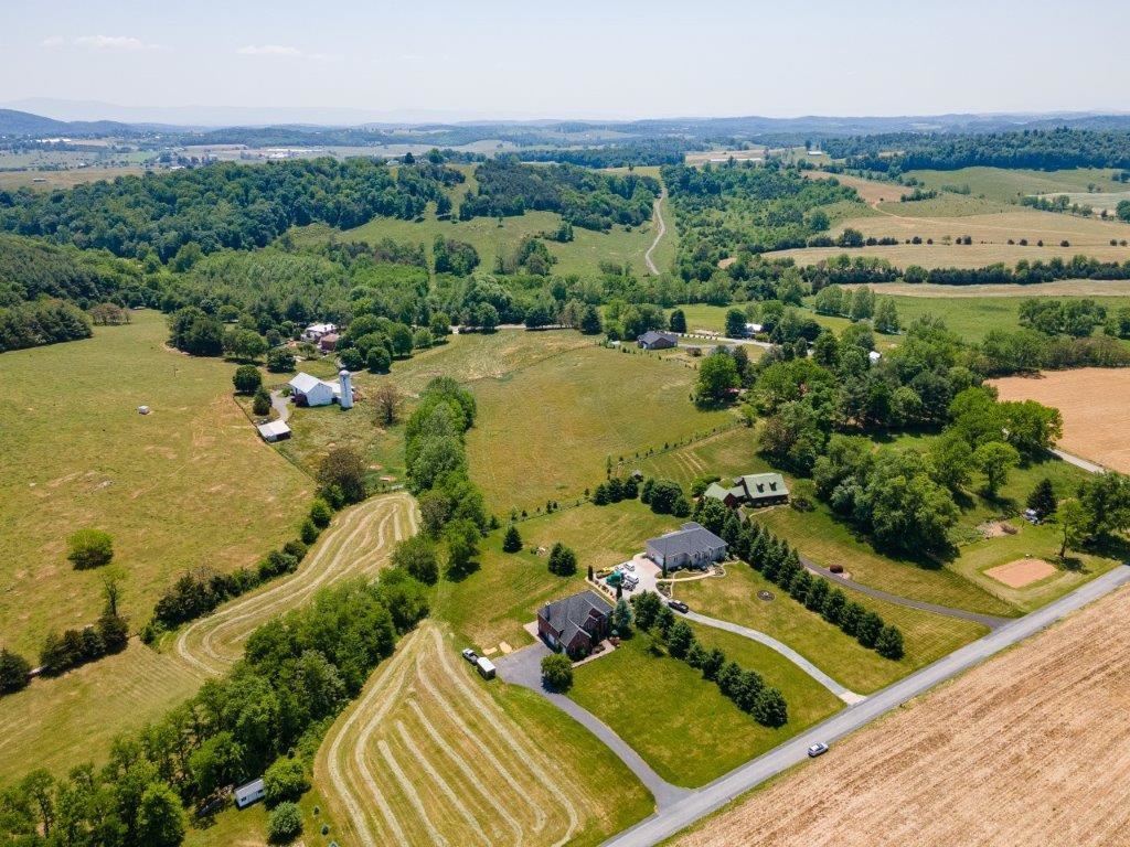 61 Bridgewater Road Bridgewater, VA 22812 - Photo 62 of 75 an aerial view of a house with a garden and lake view