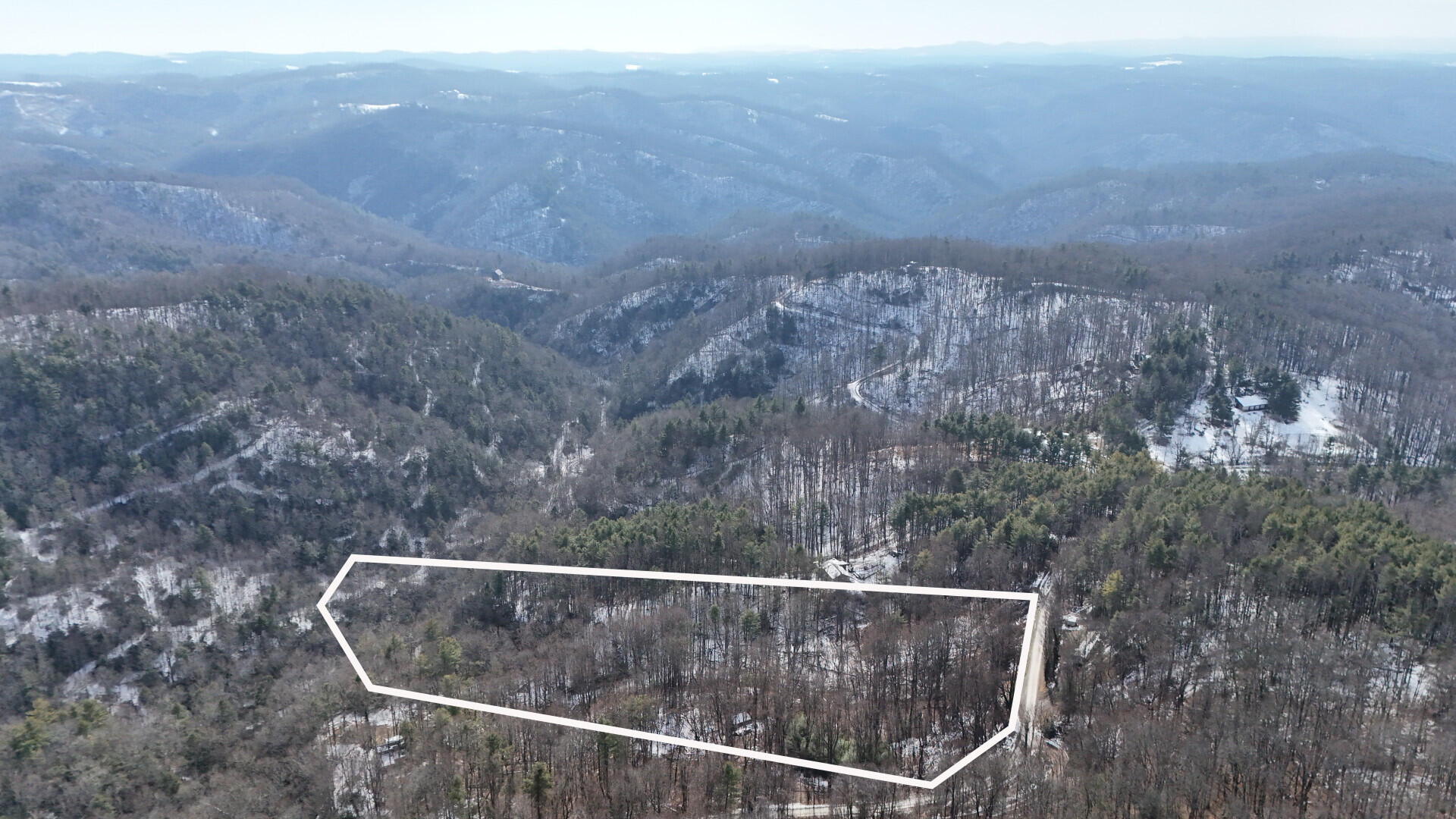 Tbd Sugar Run Road Northeast Copper Hill, VA 24079 - Photo 3 of 12 a view of a roof with a forest