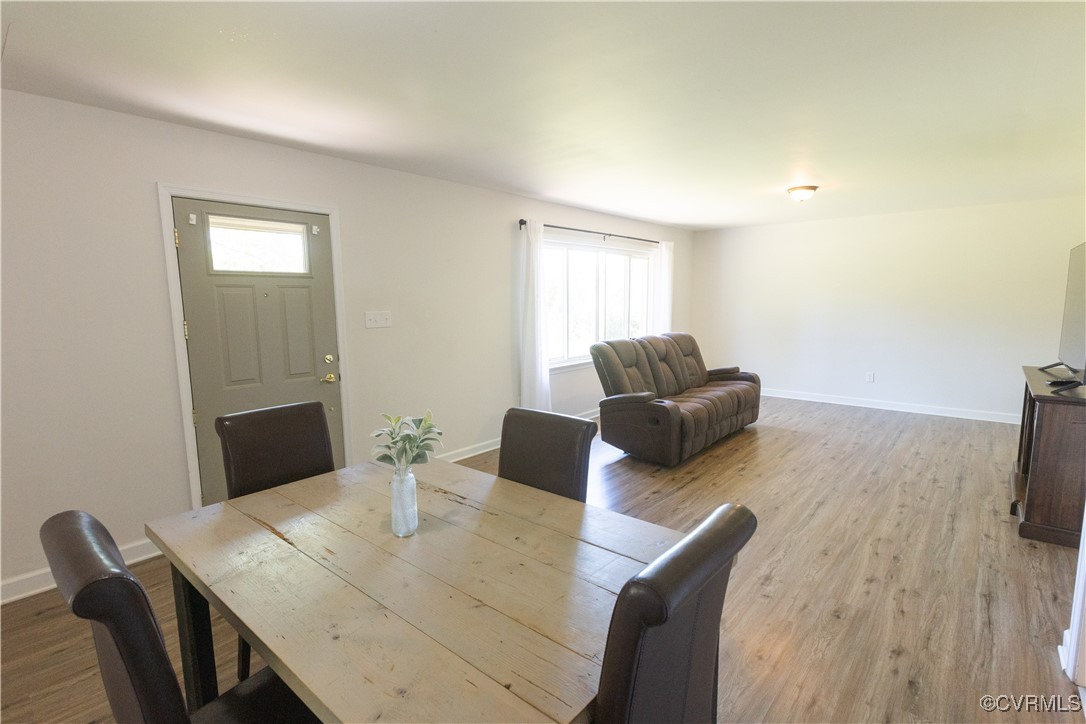 2729 Cumberland Road Farmville, VA 23901 - Photo 12 of 45 a view of a dining room with furniture and wooden floor
