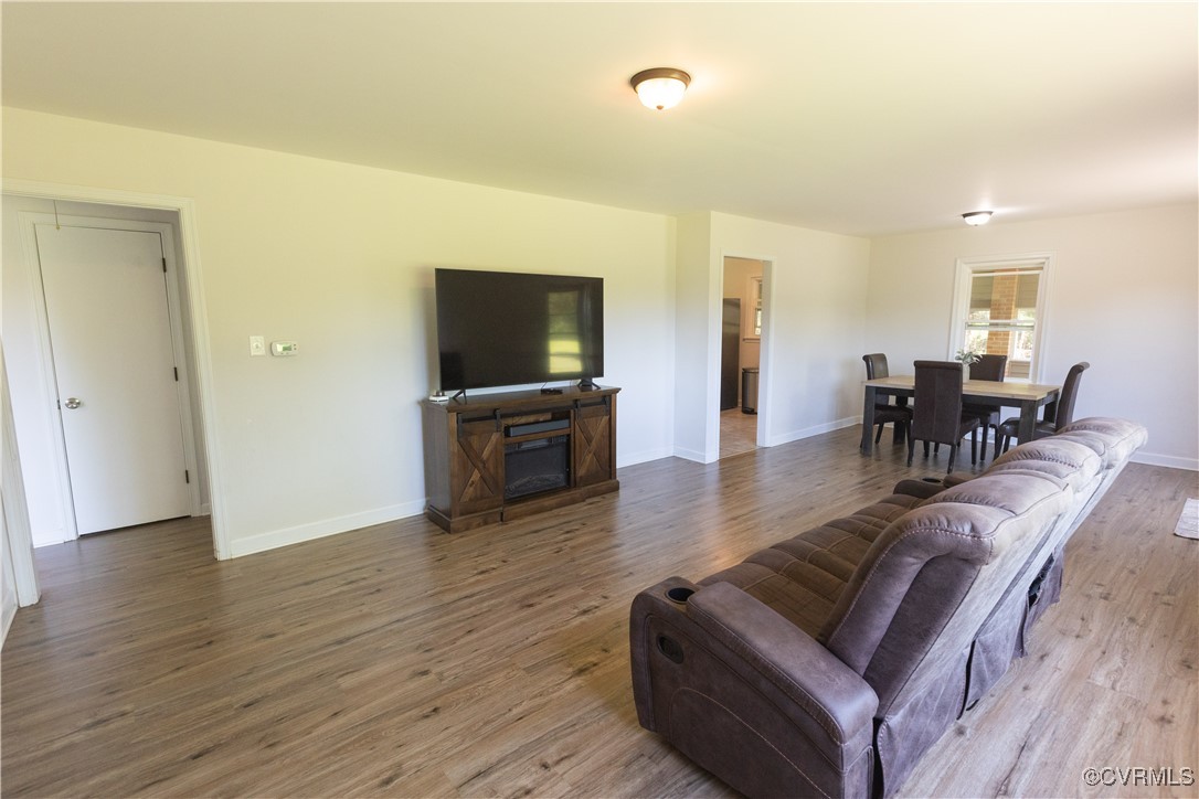 2729 Cumberland Road Farmville, VA 23901 - Photo 16 of 45 a living room with fireplace furniture and a flat screen tv