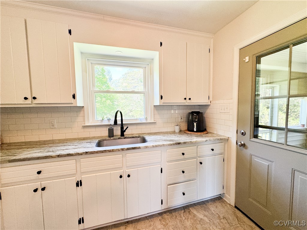 2729 Cumberland Road Farmville, VA 23901 - Photo 22 of 45 a kitchen with appliances cabinets and a window