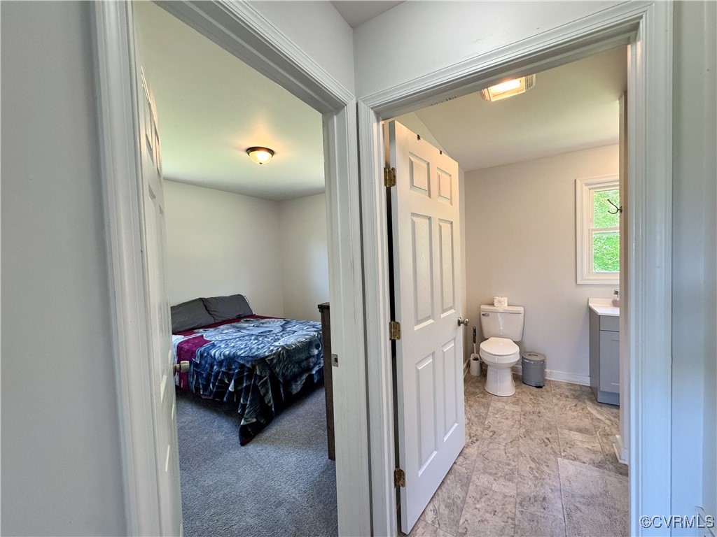 2729 Cumberland Road Farmville, VA 23901 - Photo 29 of 45 a bathroom with a sink and a mirror