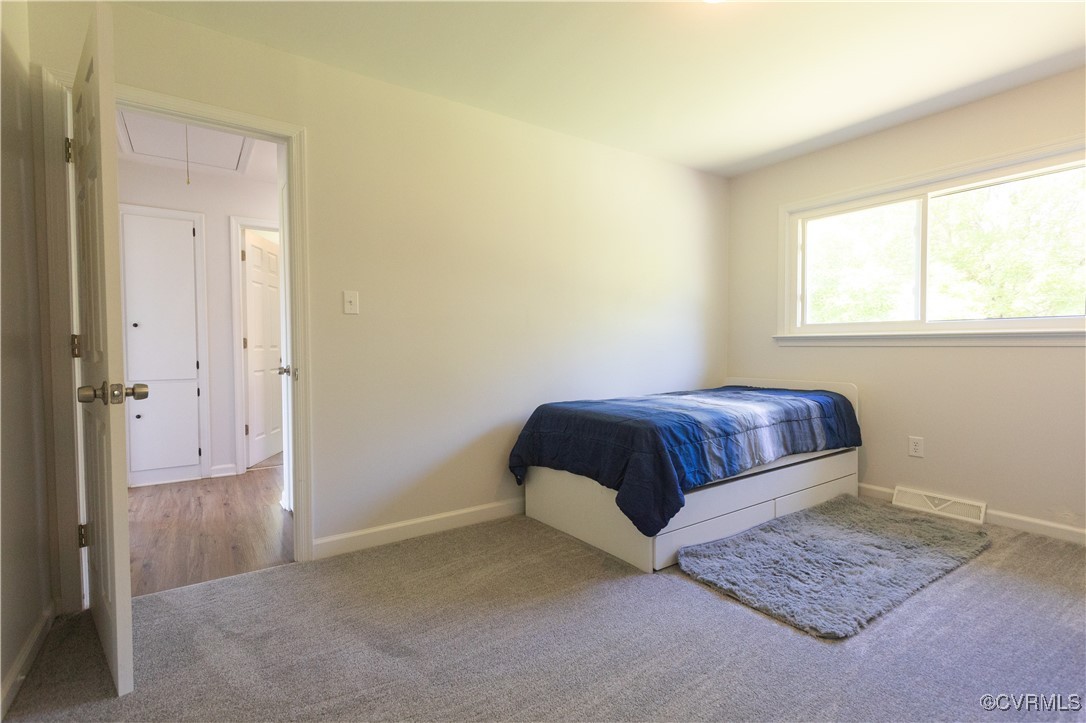 2729 Cumberland Road Farmville, VA 23901 - Photo 32 of 45 a bedroom with a bed and a window