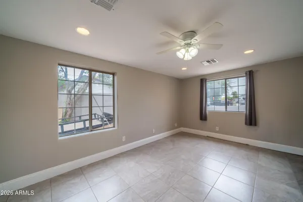 a view of an empty room with a window