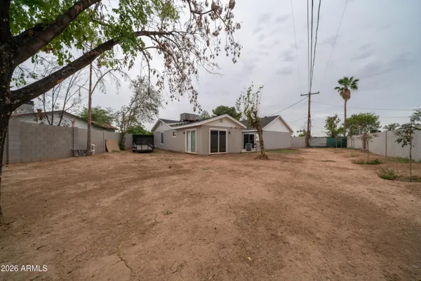 a house with trees in front of it