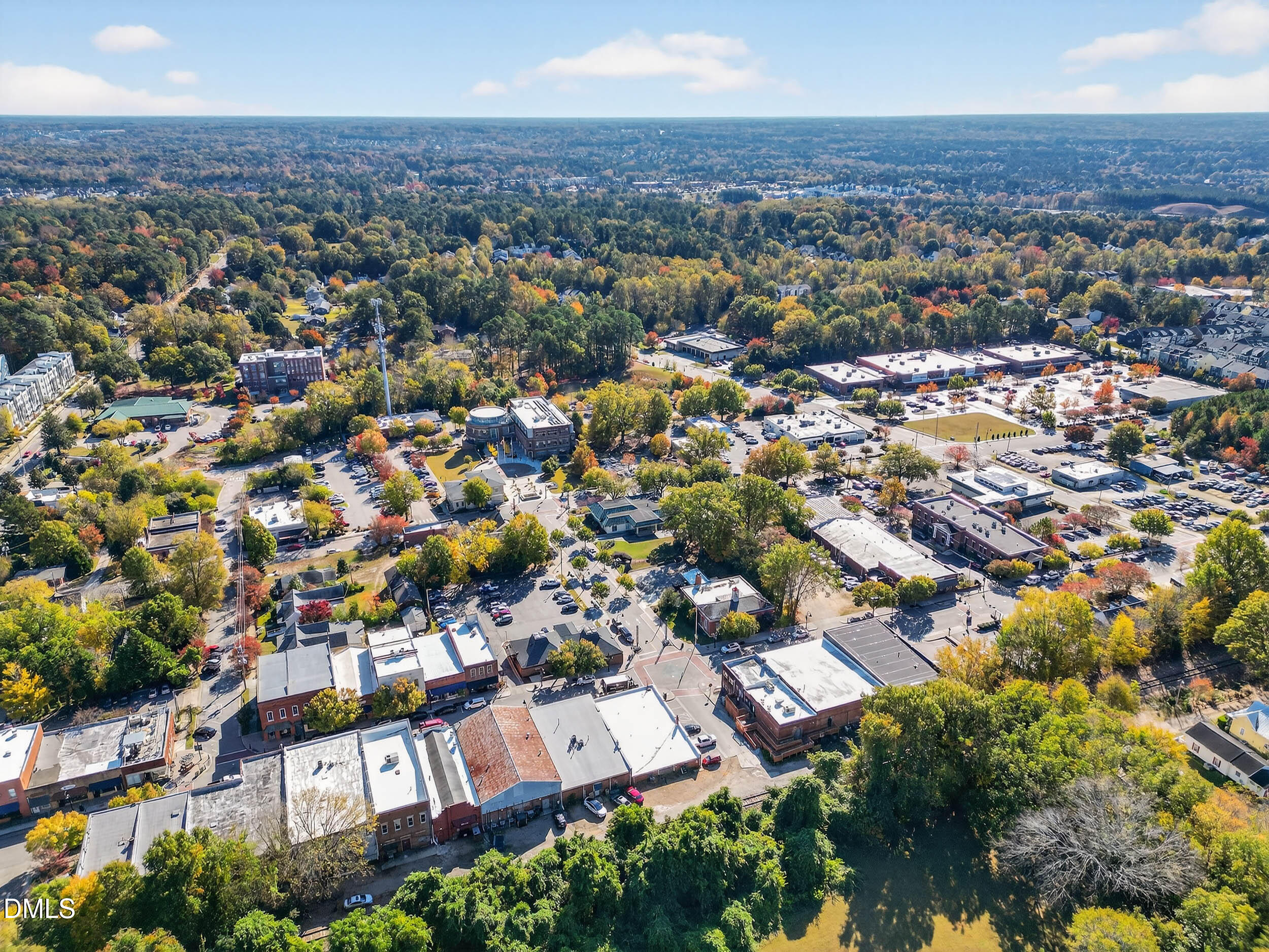 0 Carroll Street Wake Forest, NC 27587 - Photo 9 of 13 an aerial view of residential houses with outdoor space and trees