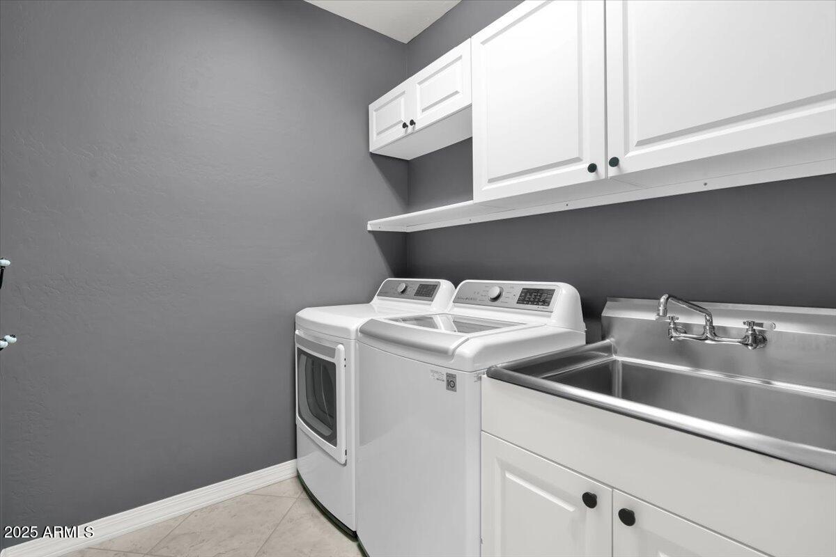 3214 North Springfield Street Buckeye, AZ 85396 - Photo 31 of 64 a utility room with dryer and washer