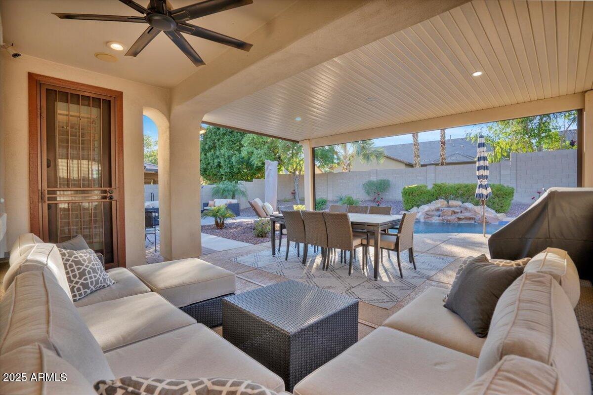 3214 North Springfield Street Buckeye, AZ 85396 - Photo 41 of 64 a living room with furniture and a large window
