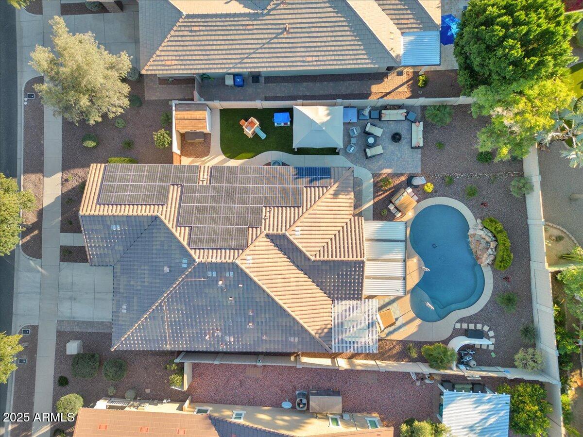 3214 North Springfield Street Buckeye, AZ 85396 - Photo 56 of 64 a front view of a house with garden