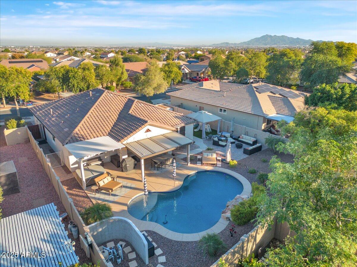 3214 North Springfield Street Buckeye, AZ 85396 - Photo 57 of 64 an aerial view of residential houses with outdoor space and ocean view