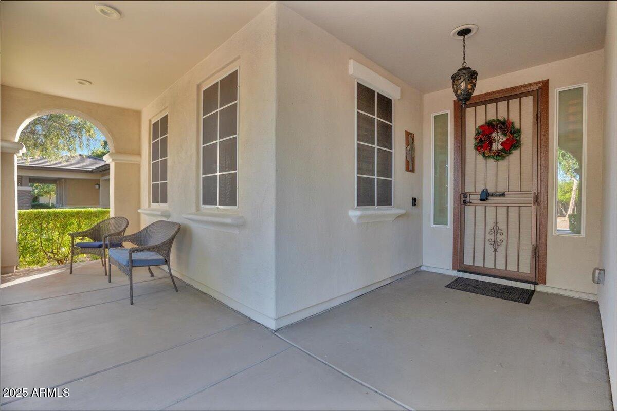 3214 North Springfield Street Buckeye, AZ 85396 - Photo 6 of 64 a living room with furniture and a window