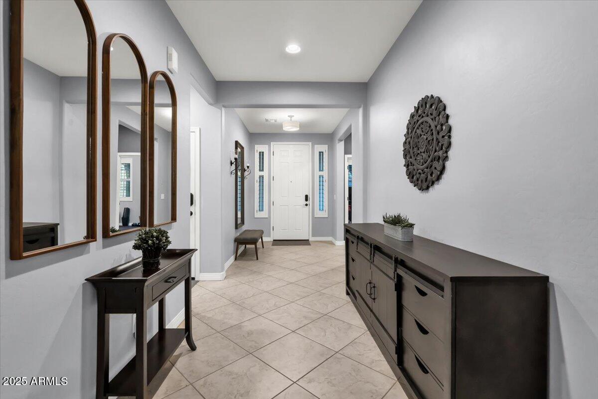 3214 North Springfield Street Buckeye, AZ 85396 - Photo 7 of 64 an empty room with windows