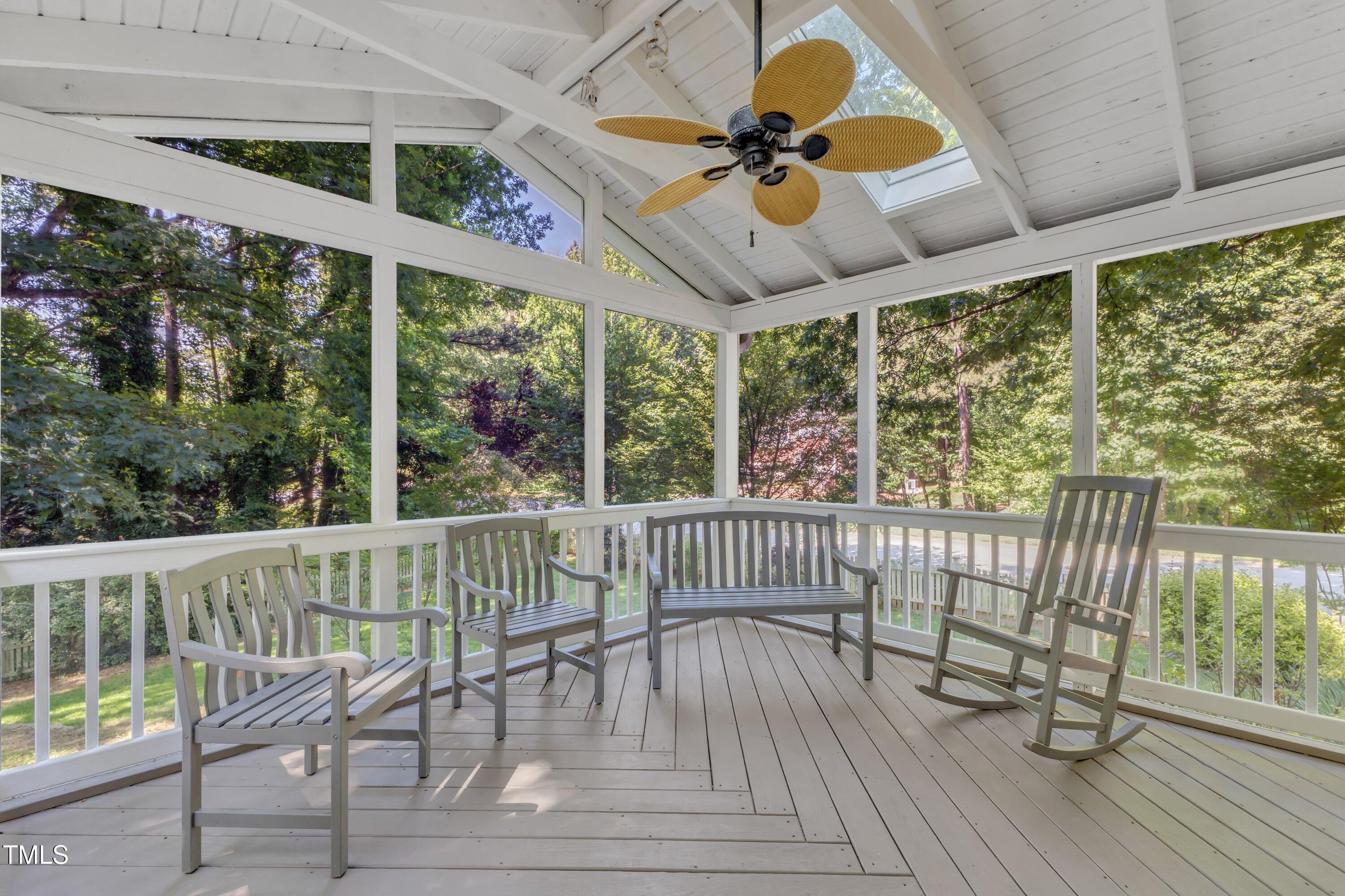 2125 Oakcrest Court Raleigh, NC 27612 - Photo 59 of 74 a view of a porch with furniture and a yard