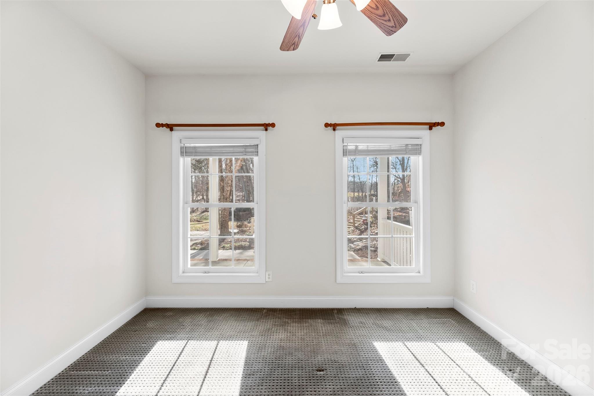 17858 Red Ridge Court Locust, NC 28097 - Photo 16 of 44 an empty room with windows