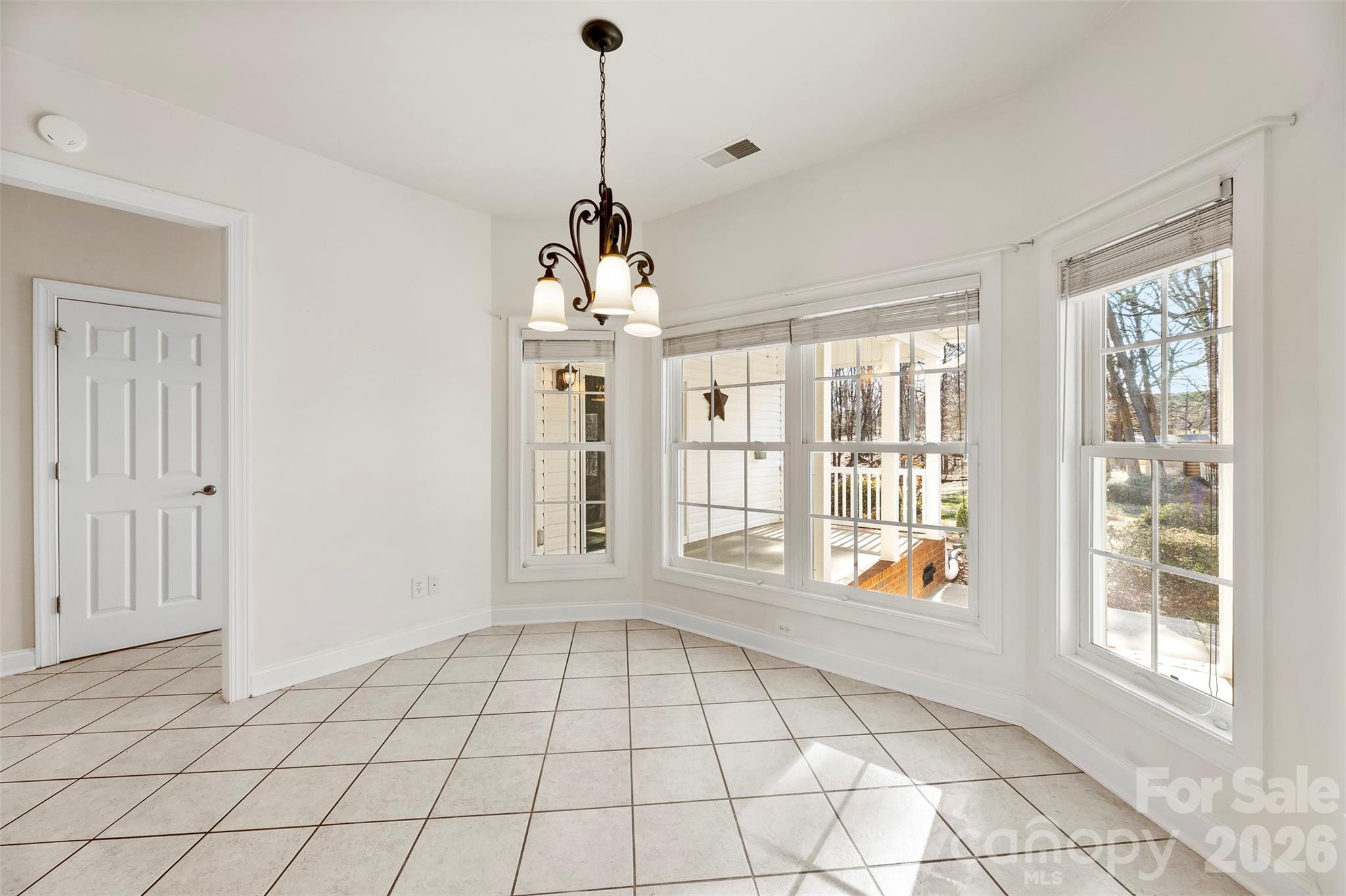 17858 Red Ridge Court Locust, NC 28097 - Photo 20 of 44 a view of an empty room with a window