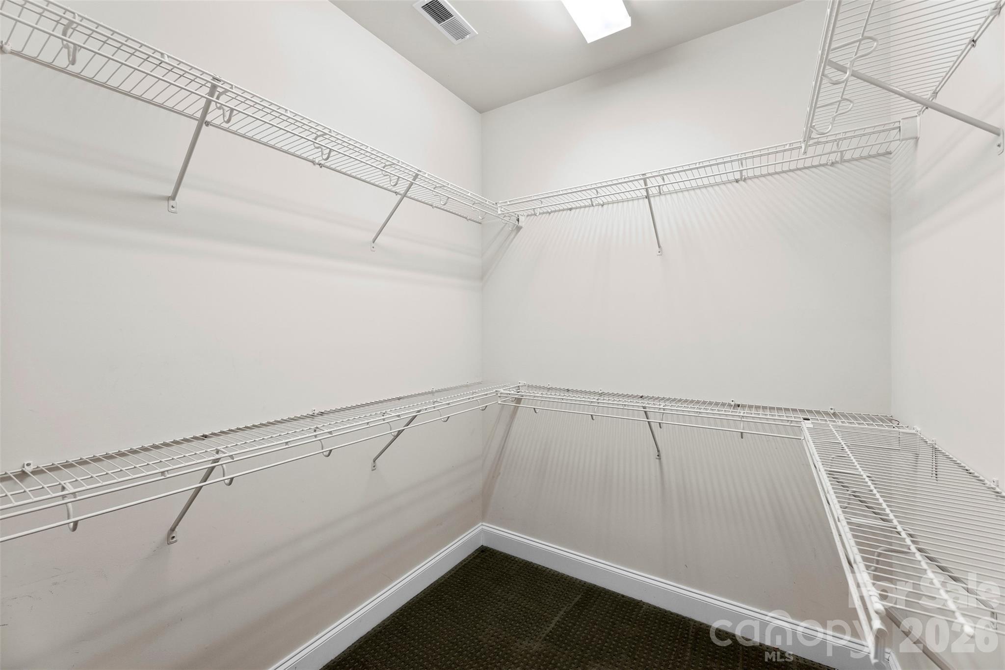17858 Red Ridge Court Locust, NC 28097 - Photo 30 of 44 a view of a room with racks on the wall