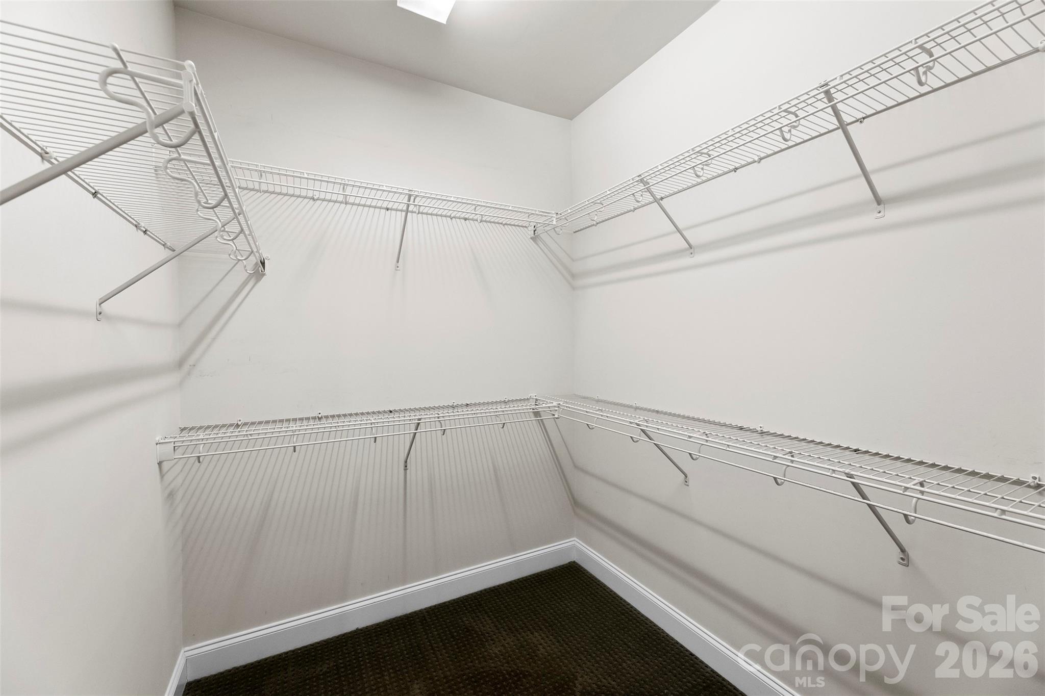 17858 Red Ridge Court Locust, NC 28097 - Photo 31 of 44 a view of a room with racks on the wall