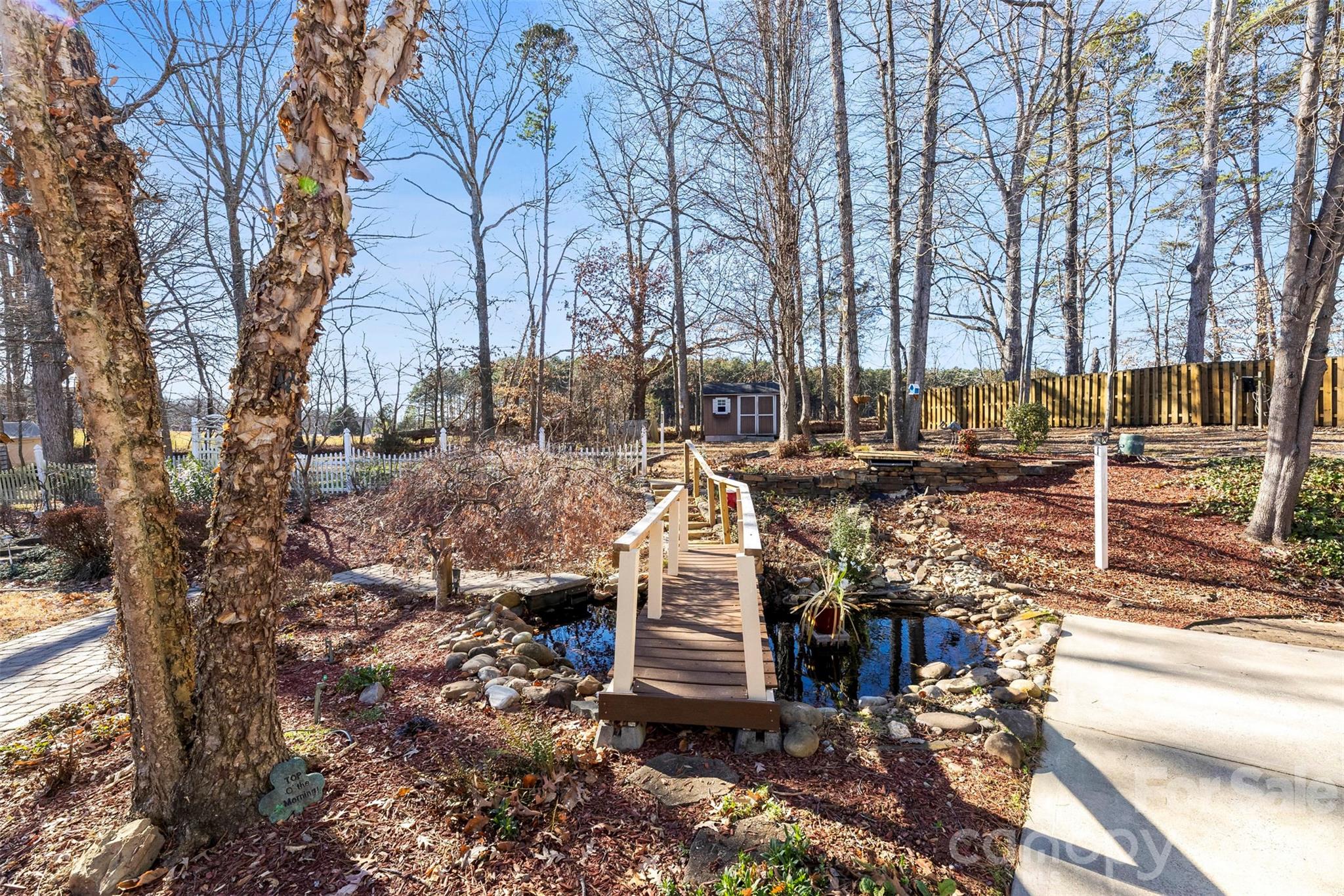 17858 Red Ridge Court Locust, NC 28097 - Photo 36 of 44 a view of a yard with large trees