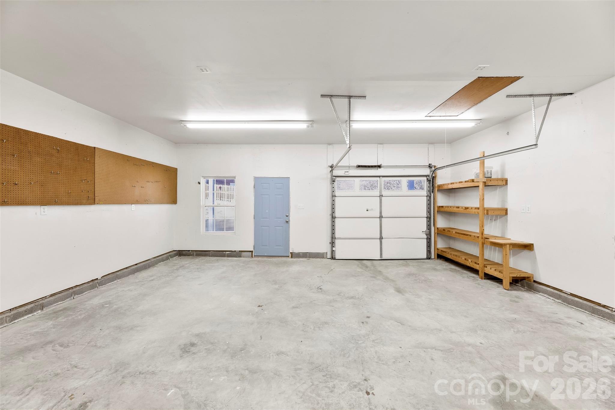 17858 Red Ridge Court Locust, NC 28097 - Photo 41 of 44 a view of a garage room