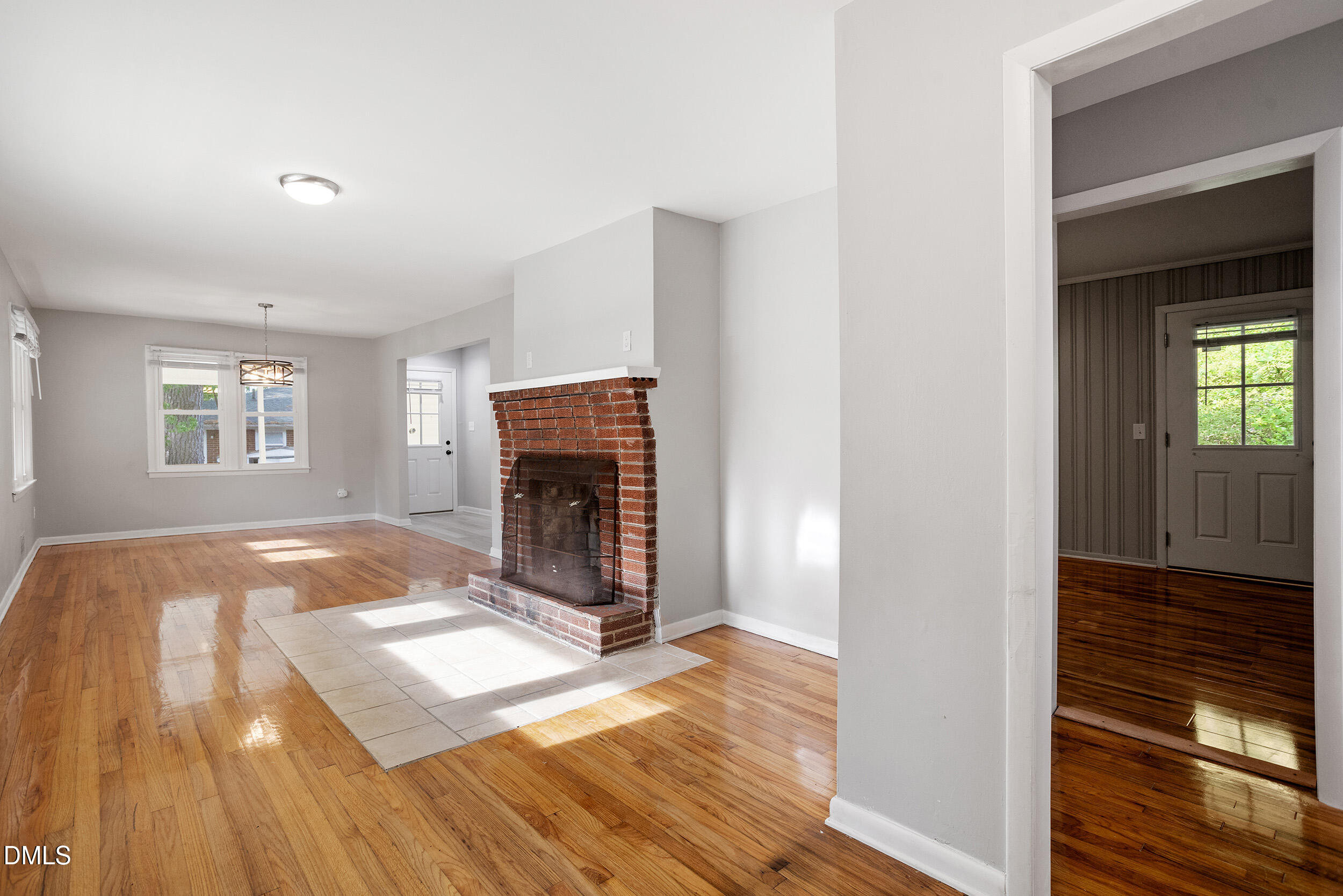 2414 Chapin Street Durham, NC 27707 - Photo 3 of 30 a view of empty room with wooden floor and fan