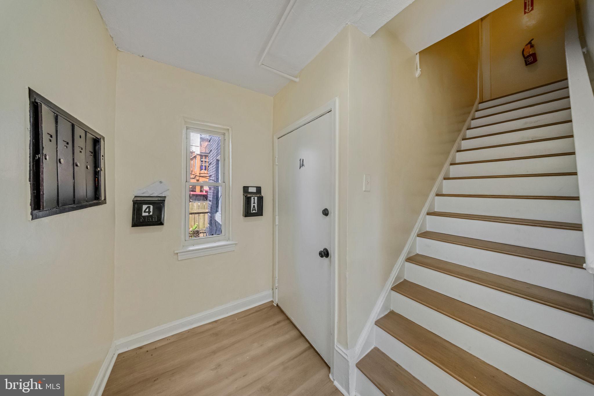 337 Delafield Place Northwest Washington, DC 20011 - Photo 60 of 72 Welcoming entryway with staircase charm.