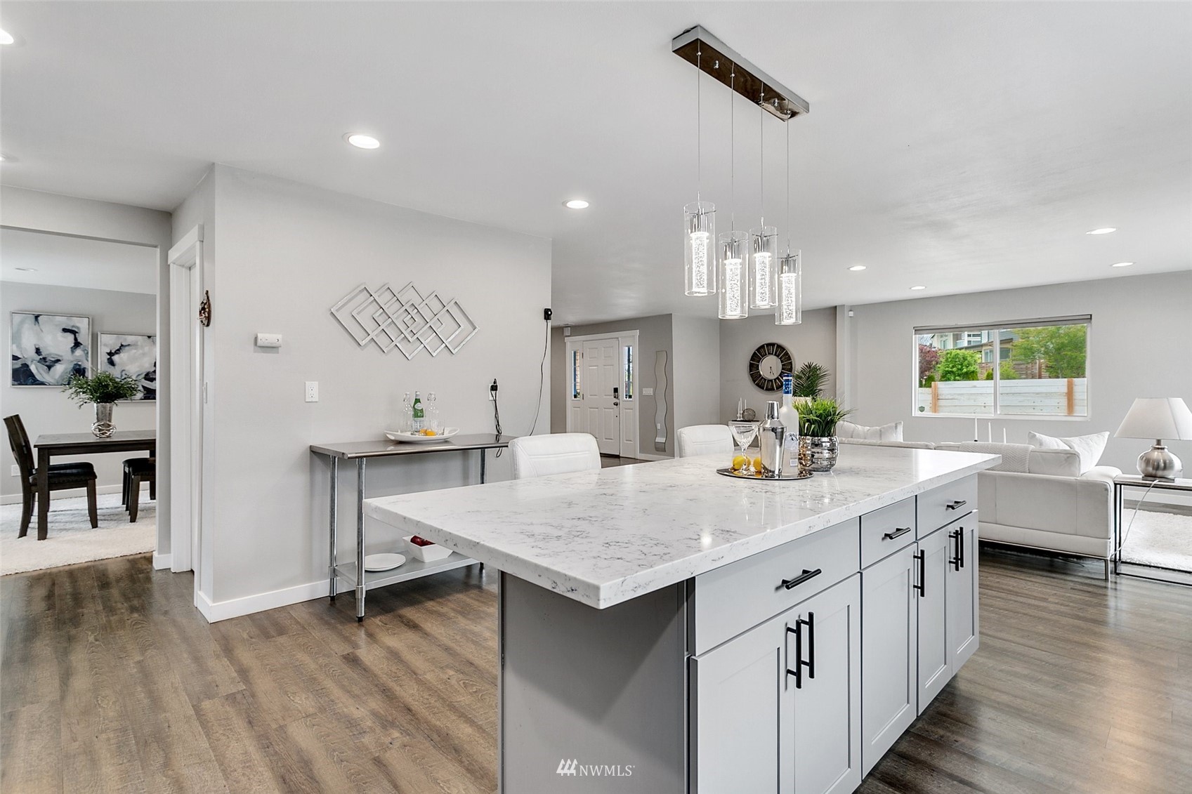 16543 Benson Road South Renton, WA 98055 - Photo 8 of 40 a kitchen with a sink dishwasher cabinets and wooden floor