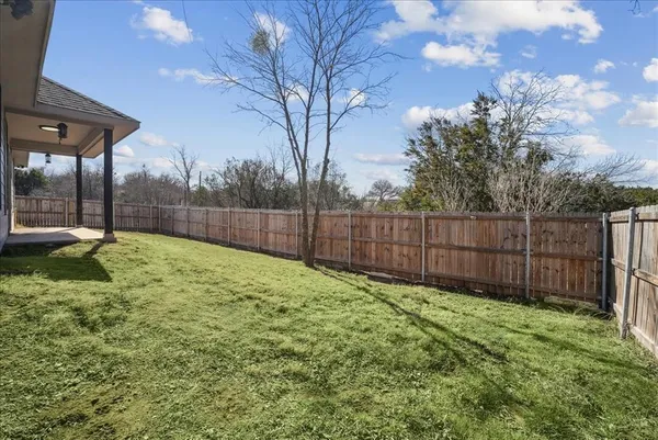 a view of outdoor space and yard