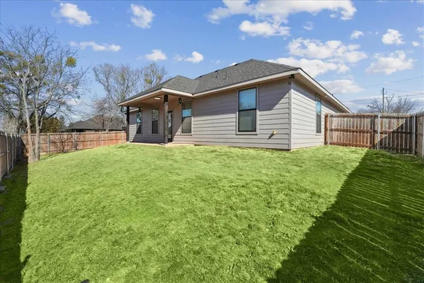 a house view with a garden space