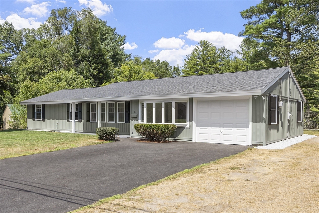 14 Janet Road Chelmsford, MA 01824 - Photo 1 of 36 a front view of a house with a garden