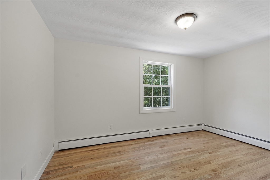 14 Janet Road Chelmsford, MA 01824 - Photo 13 of 36 an empty room with a empty space and a window