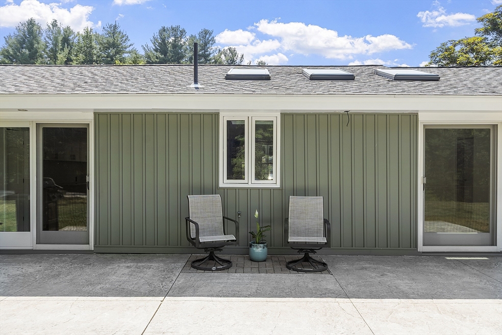 14 Janet Road Chelmsford, MA 01824 - Photo 9 of 36 a view of a house with a patio
