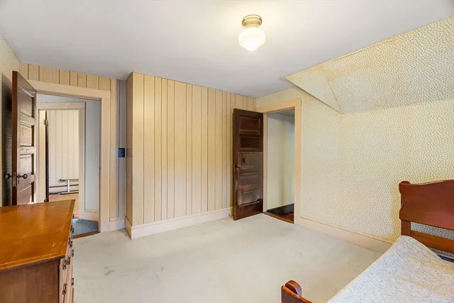a view of livingroom with furniture and cabinet